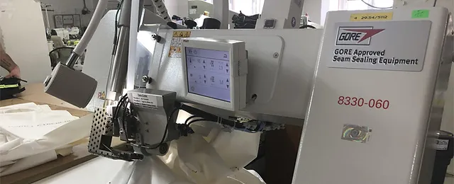 Seam sealing equipment for OEM waterproof outerwear production review