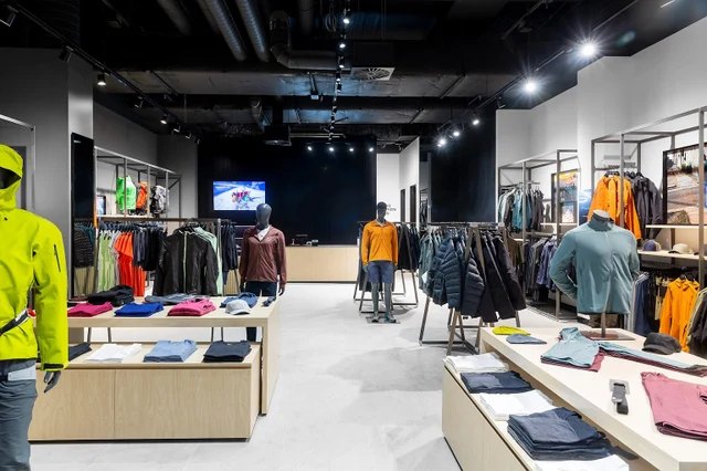Outdoor apparel showroom display for B2B technical outerwear buyers