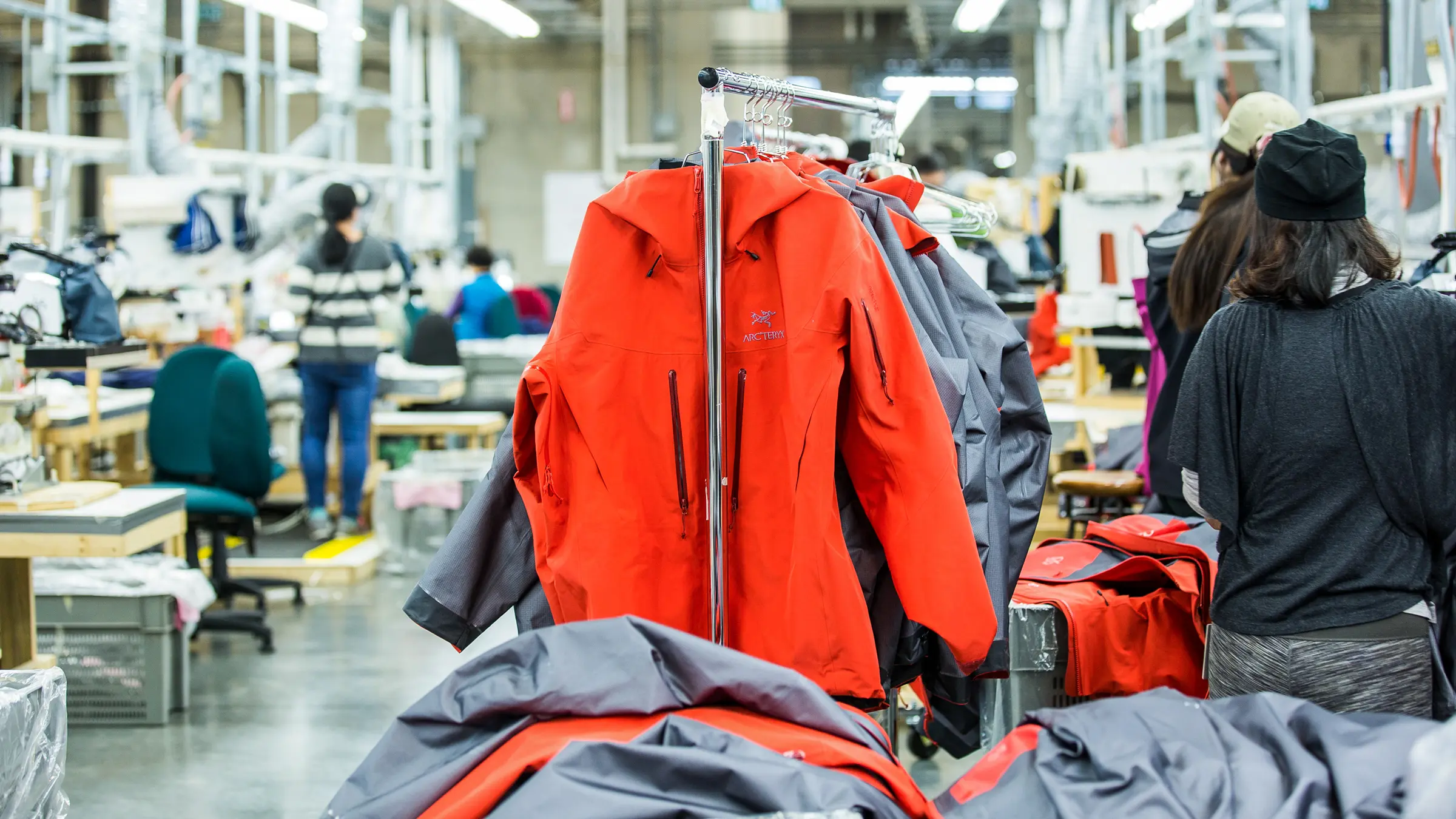 Premium shell jacket factory rack reference for OEM waterproof outerwear development